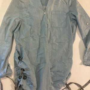 Light blue shirt with tie sides